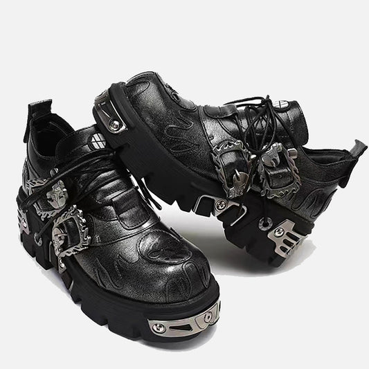 Erabyte dark punk little leather shoes featuring a black finish, flame details, and metallic buckles on chunky soles.