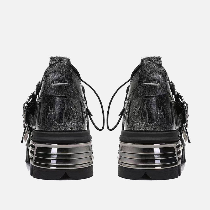 Erabyte dark punk little leather shoes featuring a sleek black design with metallic accents and unique back detailing.