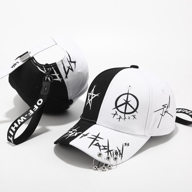 Erabyte Hat Man Baseball Cap featuring a black and white design with graphic prints and a strap detail.