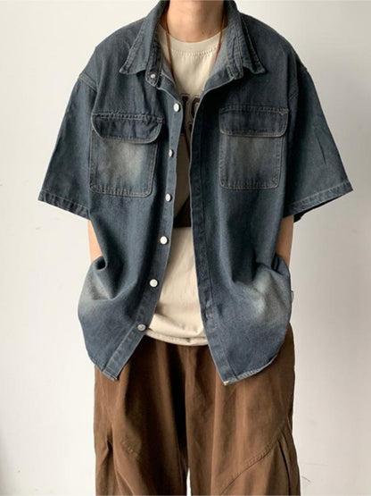 Men's denim short sleeve shirt jacket by Erabyte, featuring a relaxed fit, two chest pockets, and a faded blue wash.