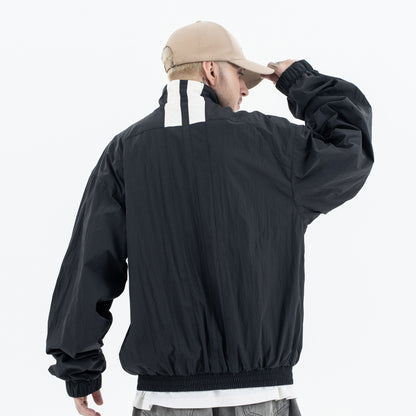 Men's jacket by Erabyte, featuring a relaxed fit, black fabric, and white stripe detail on the back.