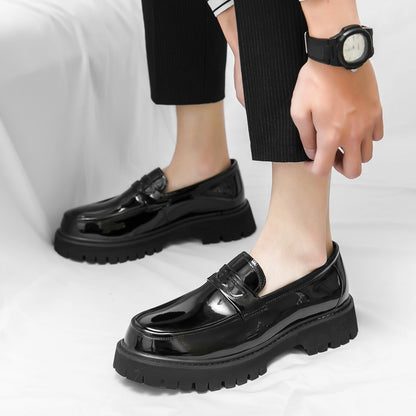Erabyte Men's Open Toe Casual Shoes in glossy black with a chunky sole, worn with black pants and a watch.