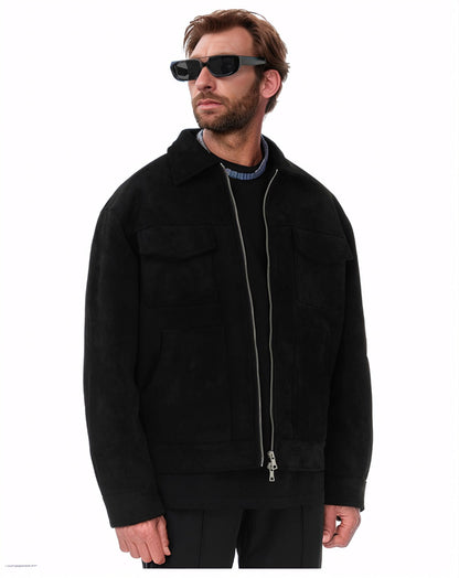 Erabyte Suede Zipper Pocket Jacket in black, featuring a relaxed fit, two front pockets, and a zip closure. Model wearing sun