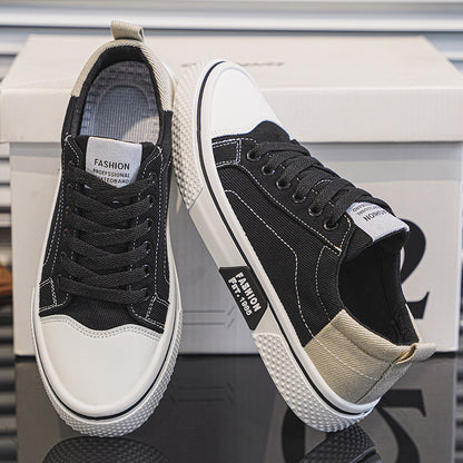 Men's Breathable Canvas Skate Shoes by Erabyte in black and white with a stylish design and textured sole.