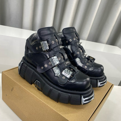 Erabyte Punk Martin Boots for women, featuring a chunky sole, multiple straps, and metallic accents, displayed on a box.