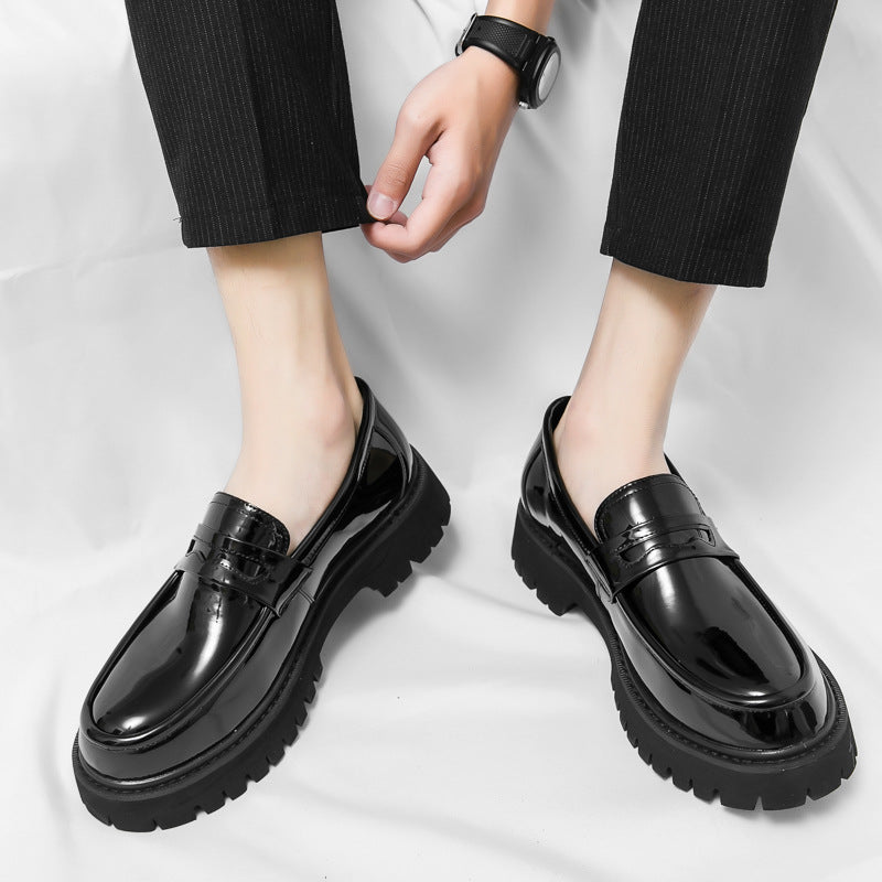 Erabyte Men's Open Toe Casual Shoes in black, featuring a sleek design and chunky sole, worn with black trousers.